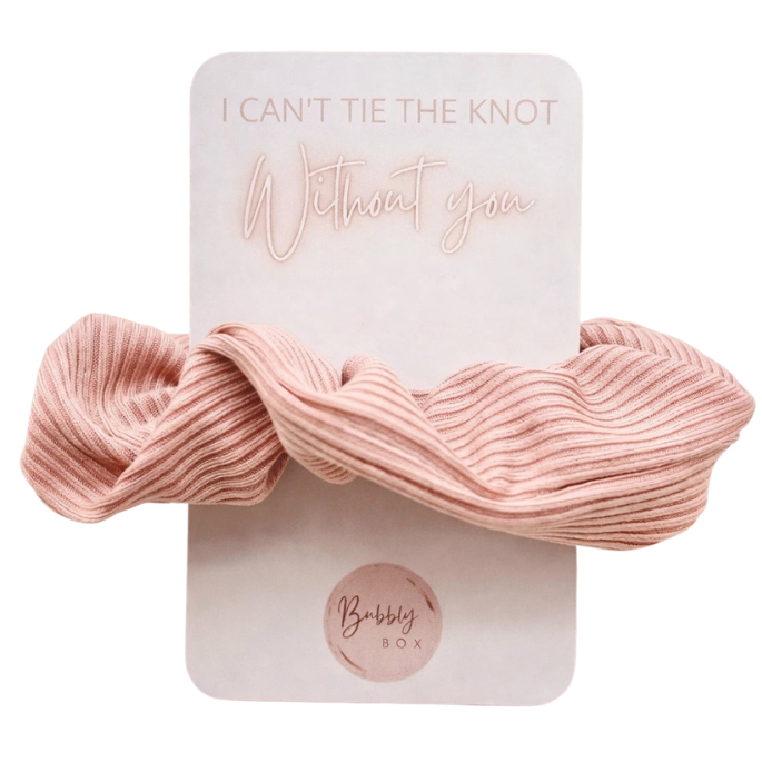 Pink scrunchie on a card with 'I Can't Tie The Knot Without You' text, brand 'Bubbly Box' visible