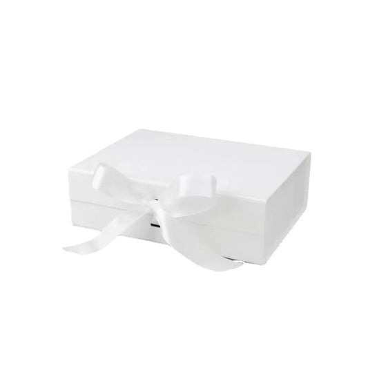 White gift box with a bow on a white background