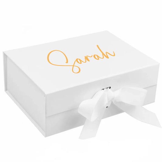 White jewelry box with 'Sarah' engraving and a white bow on a white background